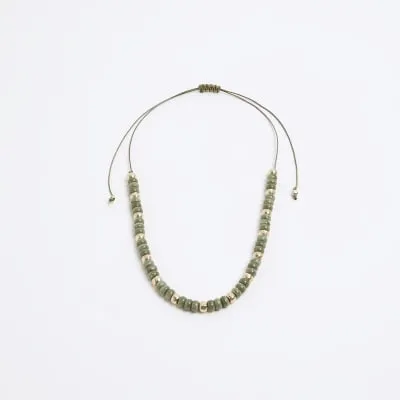 Green beaded necklace sold by River Island