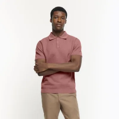Pink slim fit textured knit polo sold by River Island