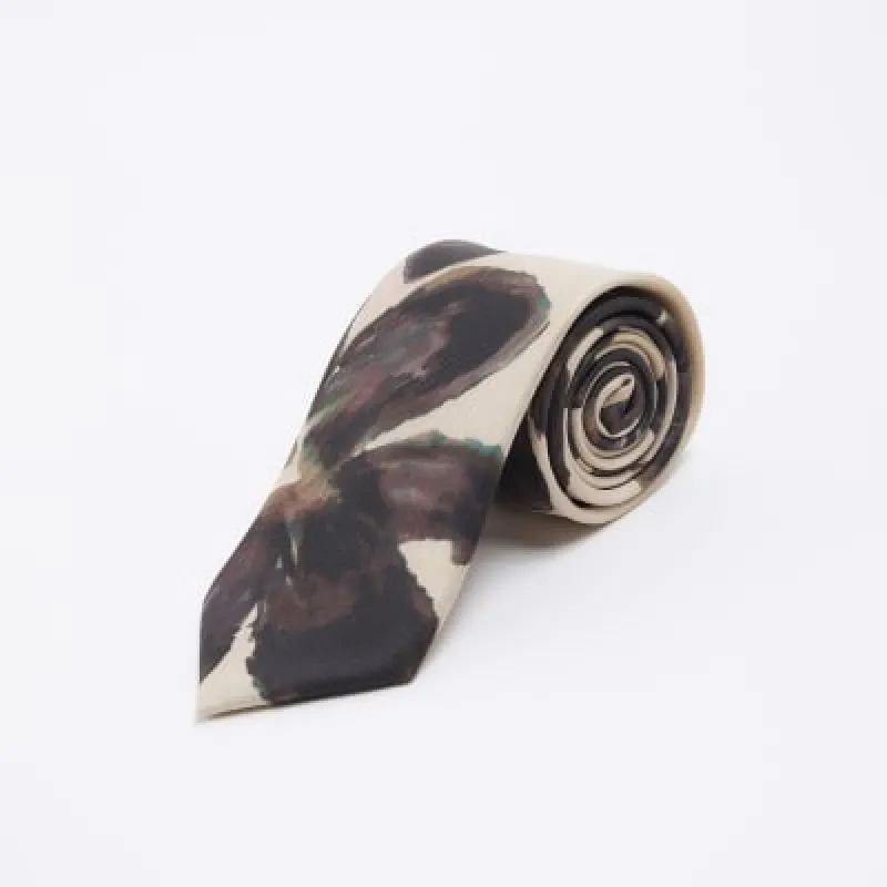 Beige floral tie sold by River Island