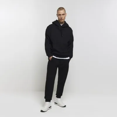 Black regular fit rib panel joggers sold by River Island