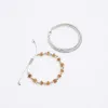 2PK silver colour beaded bracelets sold by River Island