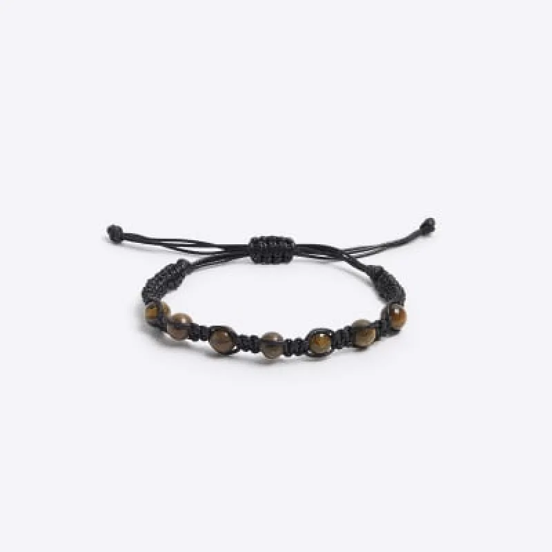 Brown tigers eye bracelet sold by River Island