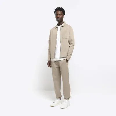 Stone slim fit textured smart joggers sold by River Island