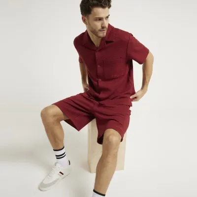 Rust regular fit quilted shorts sold by River Island