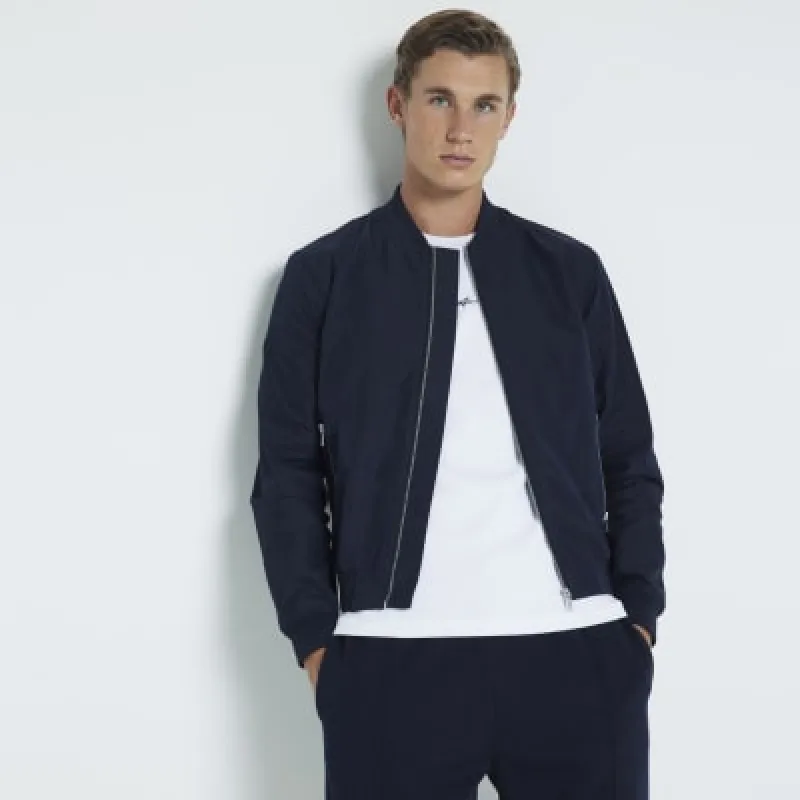 Navy regular fit zip up bomber jacket sold by River Island
