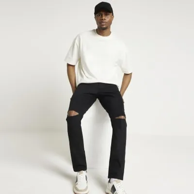 Black skinny fit ripped jeans sold by River Island