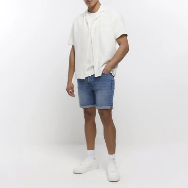 Blue slim fit faded denim shorts sold by River Island