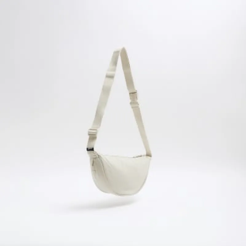 Stone crinkle bum bag sold by River Island