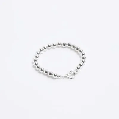 Silver colour ball chain bracelet sold by River Island
