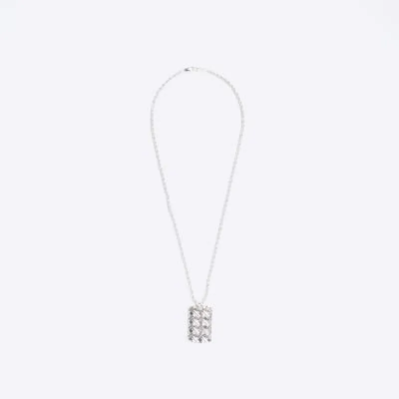 Silver plated tag necklace sold by River Island