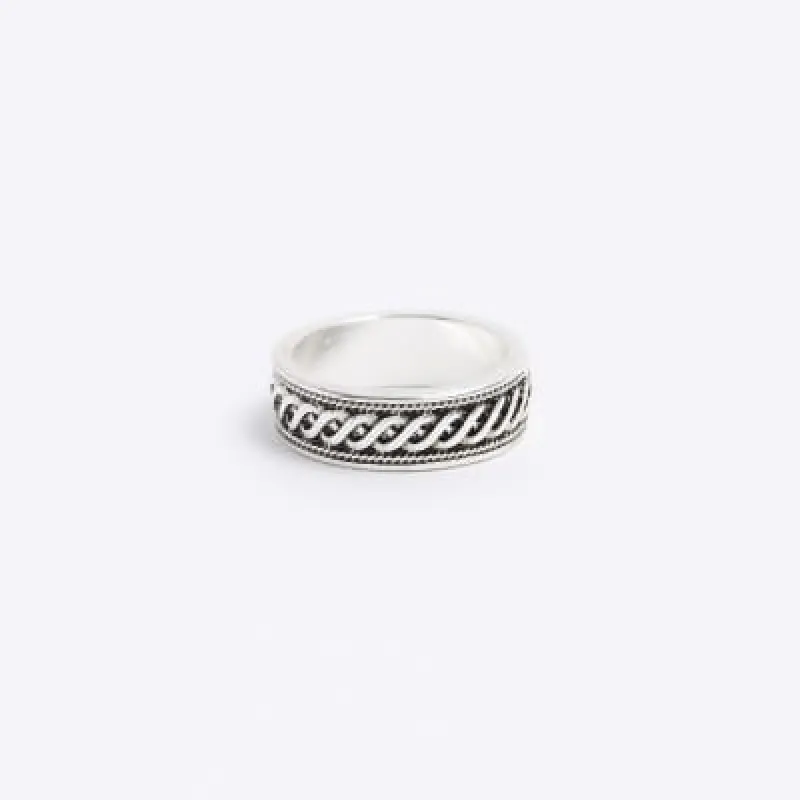 Silver colour twist ring sold by River Island