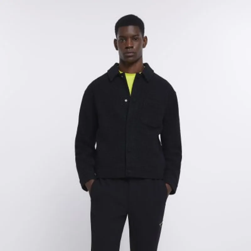 Black regular fit boucle jacket sold by River Island