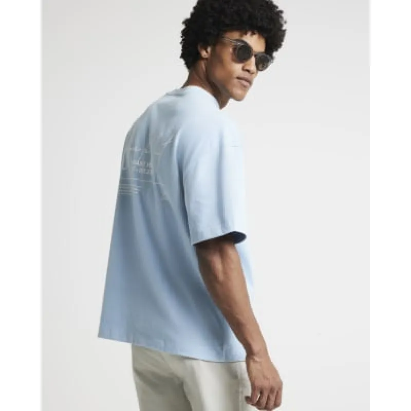 Blue oversized fit script graphic t-shirt sold by River Island