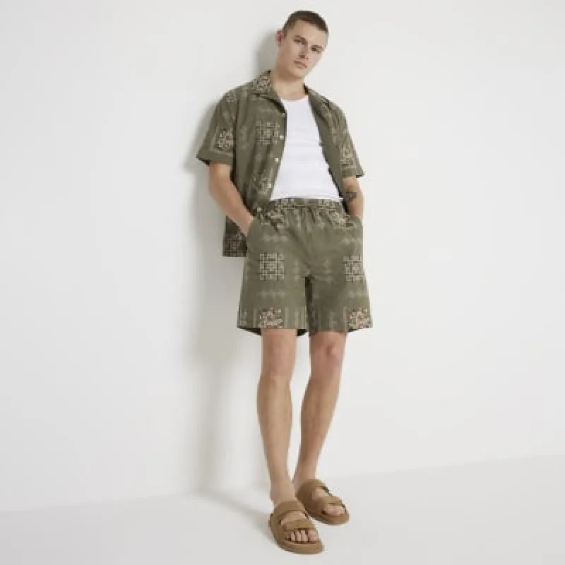 Green regular fit embroidered shorts made by River Island