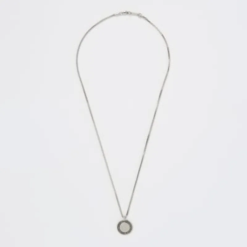 Silver colour coin pendant necklace sold by River Island