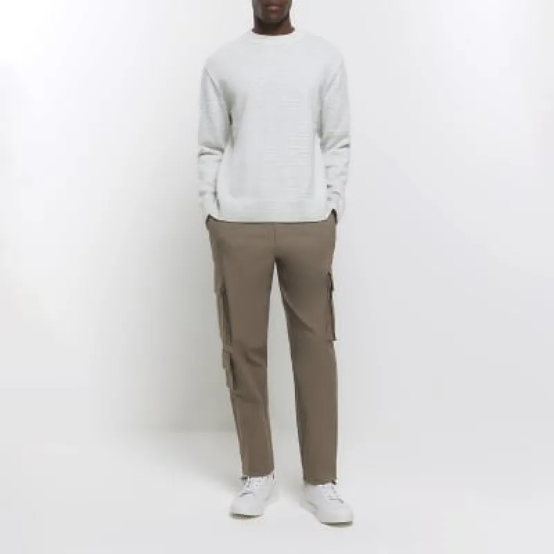 Stone slim fit smart techy cargo trousers sold by River Island