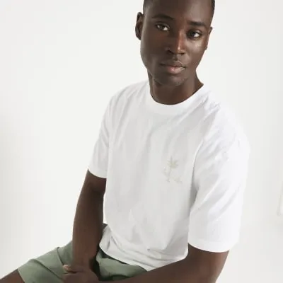 White regular fit embroidered t-shirt sold by River Island