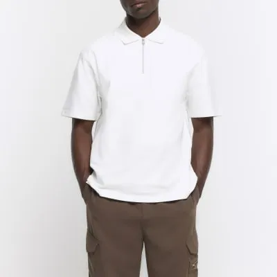 Beige regular fit textured half zip polo sold by River Island
