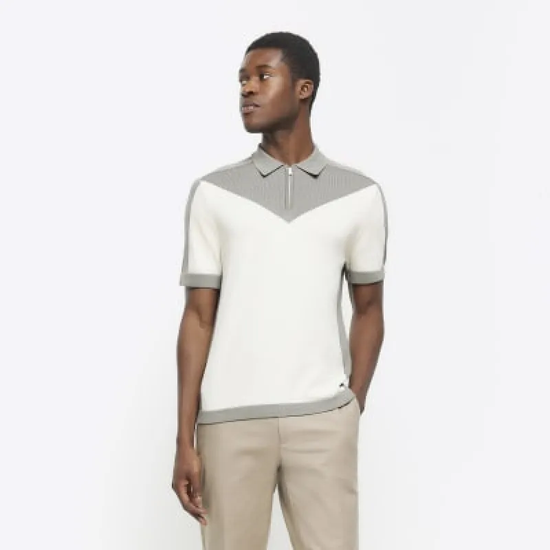 Green slim fit colour block knit polo sold by River Island
