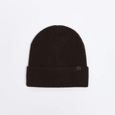 Brown knitted rib beanie sold by River Island