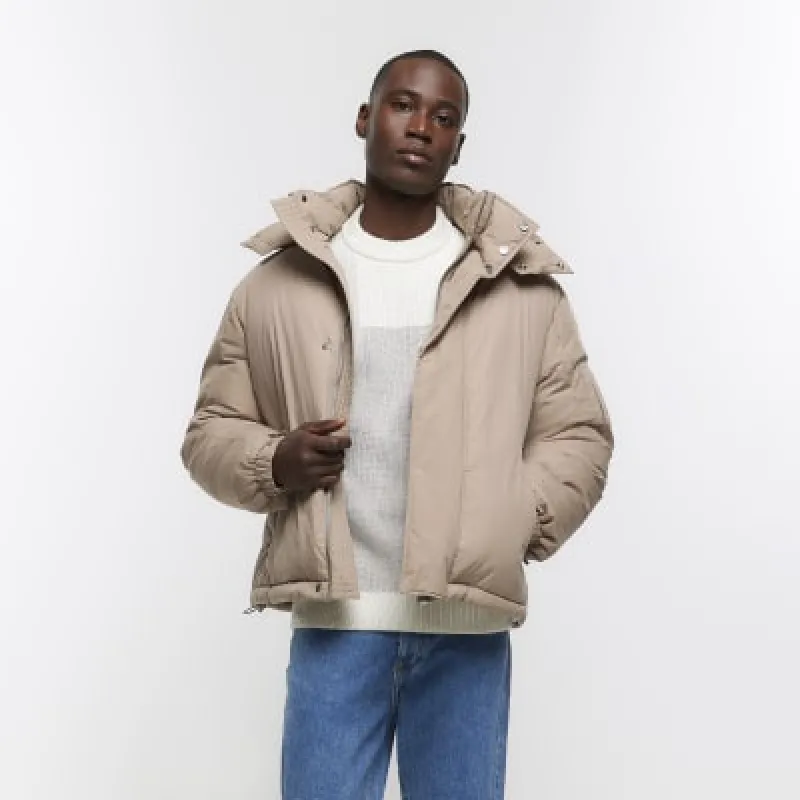 Brown regular fit hooded parka puffer jacket sold by River Island