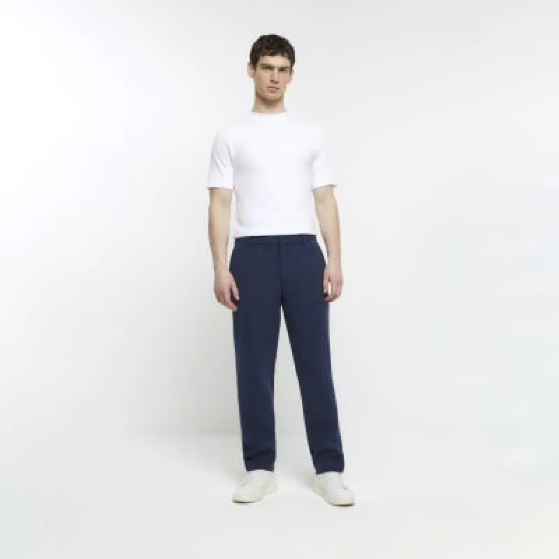 Navy slim fit textured smart trousers sold by River Island