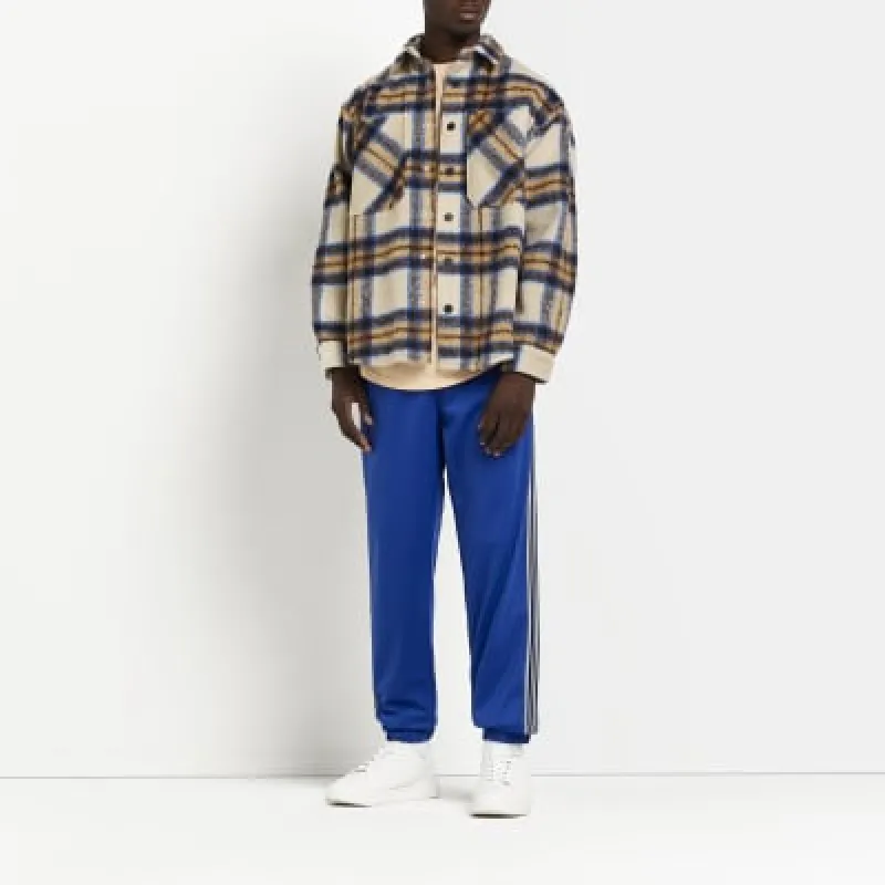 Blue Slim ft stripe Cuffed Joggers sold by River Island
