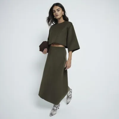 Khaki wool blend asymmetric midi skirt sold by River Island