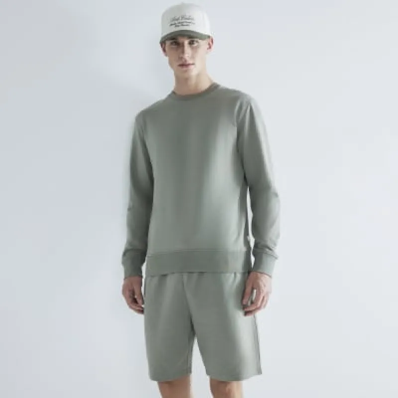Khaki Slim Fit Shorts sold by River Island