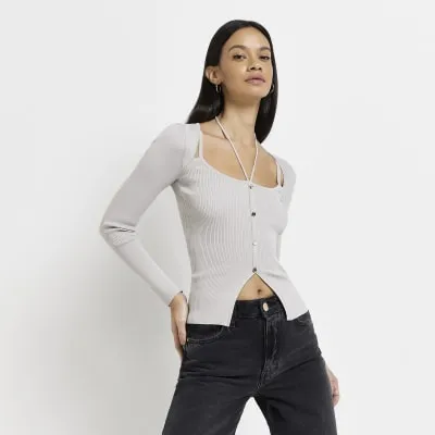Grey knit long sleeve top sold by River Island
