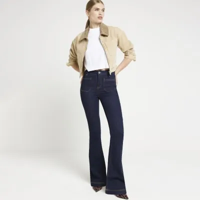 Blue front pocket flared jeans sold by River Island
