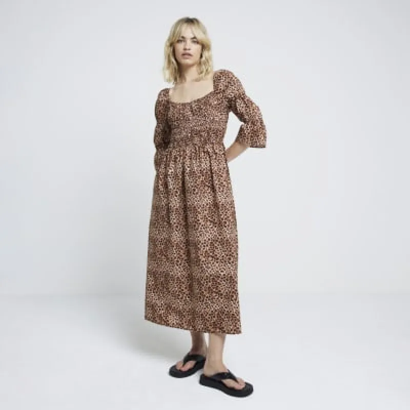 Brown leopard print shirred smock midi dress sold by River Island