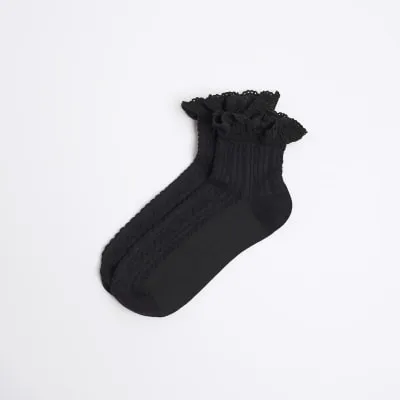 Black lace frill ankle socks sold by River Island