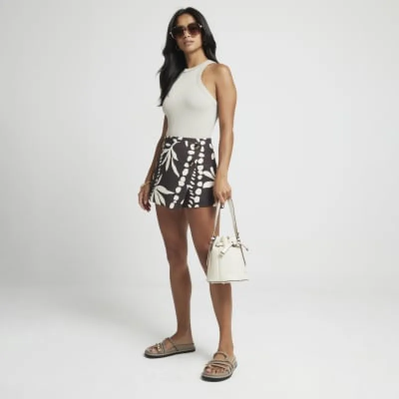 Petite brown floral wrap skort sold by River Island