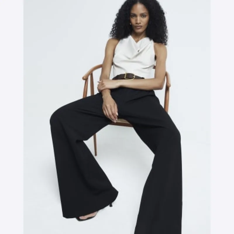 Beige faux leather halter cowl neck top sold by River Island