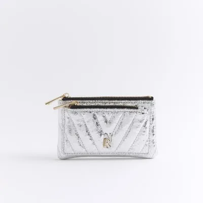 Silver quilted pouch purse sold by River Island
