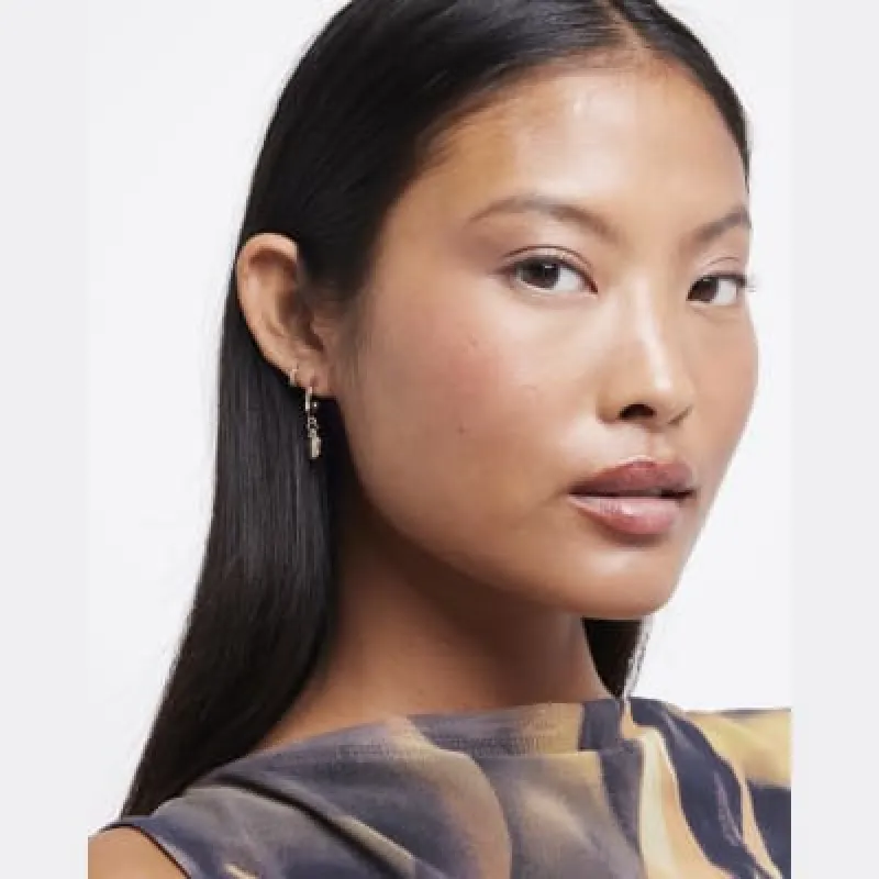 Gold heart hoop and stud earrings multipack sold by River Island