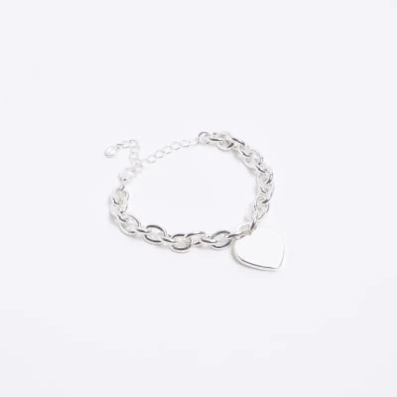 Silver heart pendant chain bracelet sold by River Island