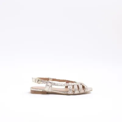 Gold leather sling back ballet pumps sold by River Island