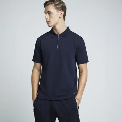 Navy slim fit textured half zip polo sold by River Island