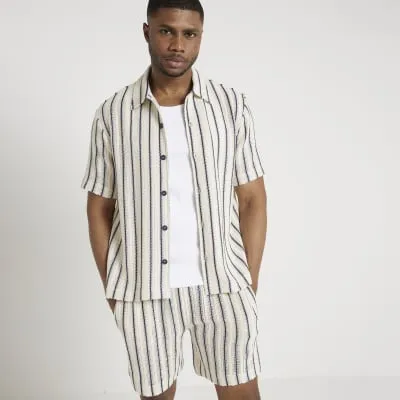 Beige regular fit crochet stripe shirt sold by River Island