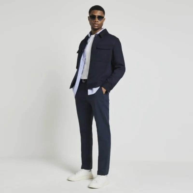 Navy slim fit belted chino trousers sold by River Island