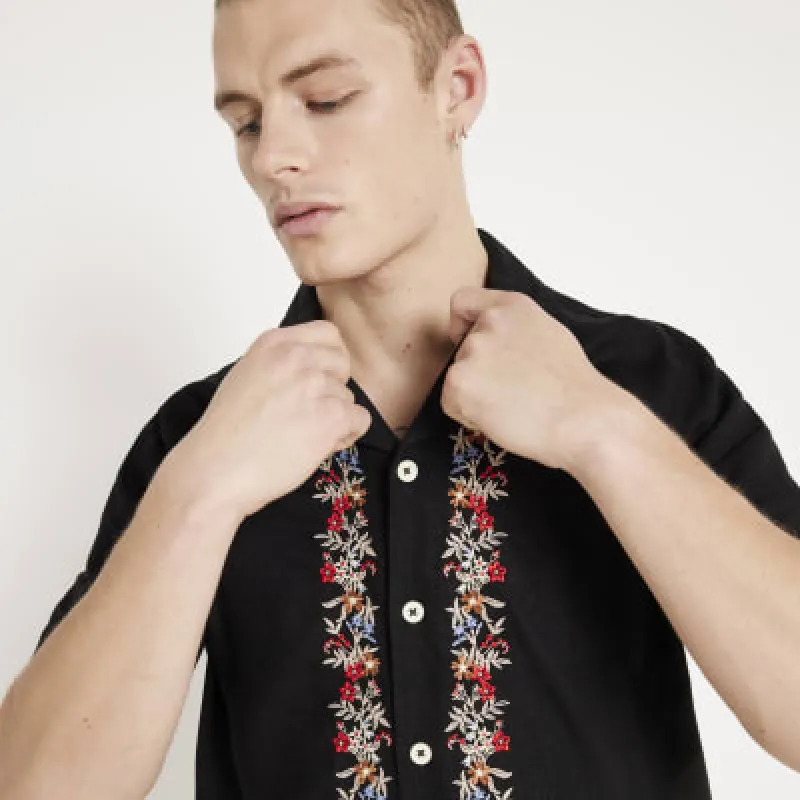 Black regular fit embroidered floral shirt sold by River Island