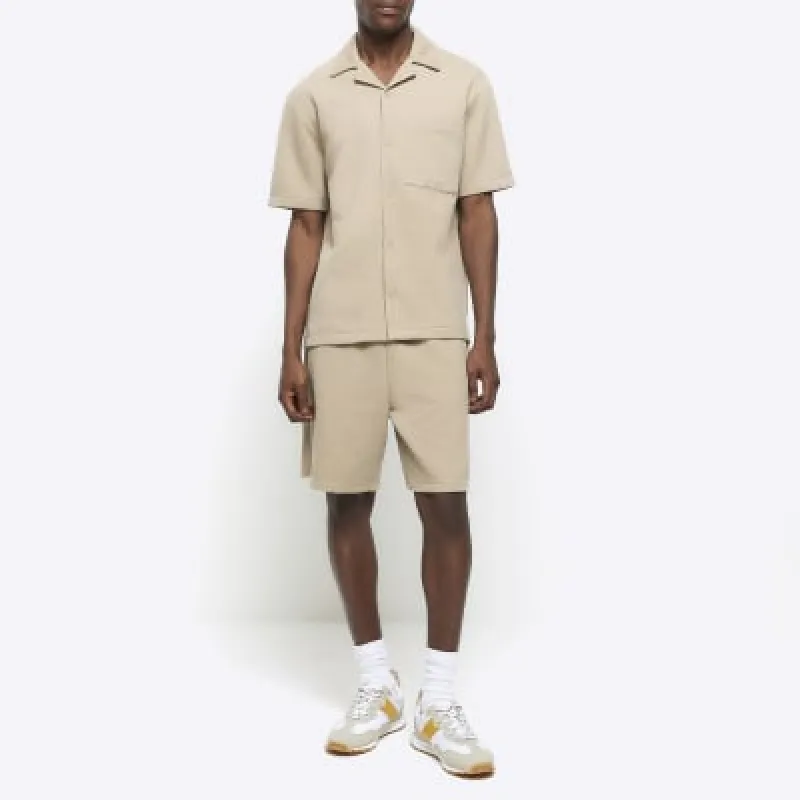 Stone regular fit quilted texture shorts made by River Island