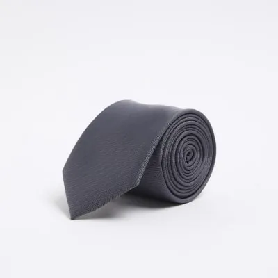 Grey herringbone core tie sold by River Island