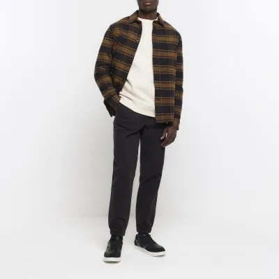 Black slim fit pull on joggers sold by River Island