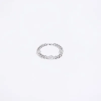 Silver colour chain link bracelet sold by River Island