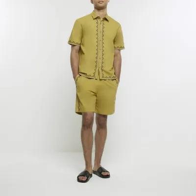 Green regular fit embroidered short sold by River Island