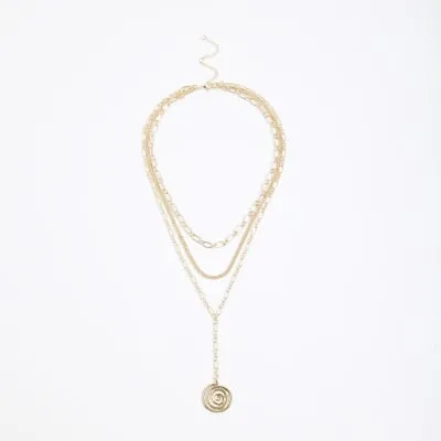 Gold Layered Disc Necklace sold by River Island