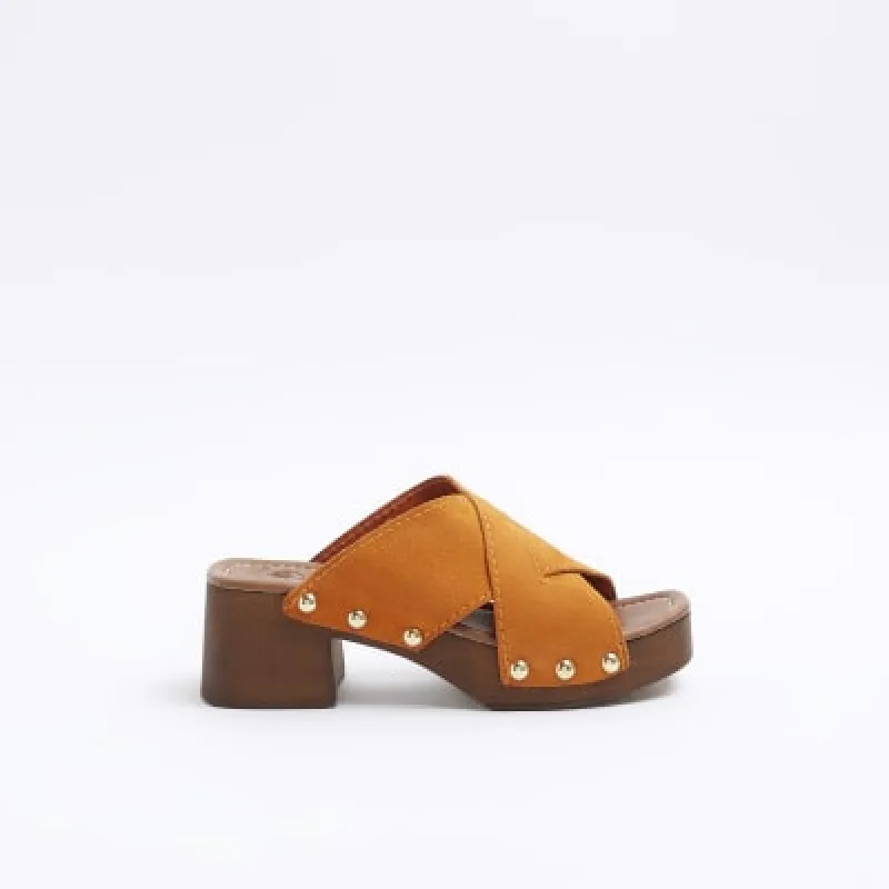 Orange suede studded clog sandals sold by River Island